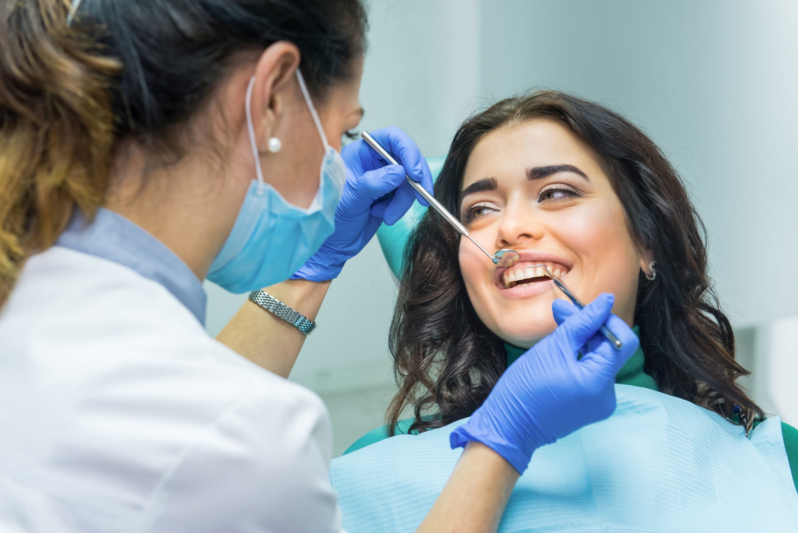 Woman at the dentist smiling.
